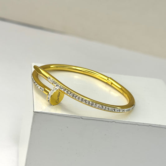 Cartier Gold-Tone Bangle - Elegant Luxury Accessory